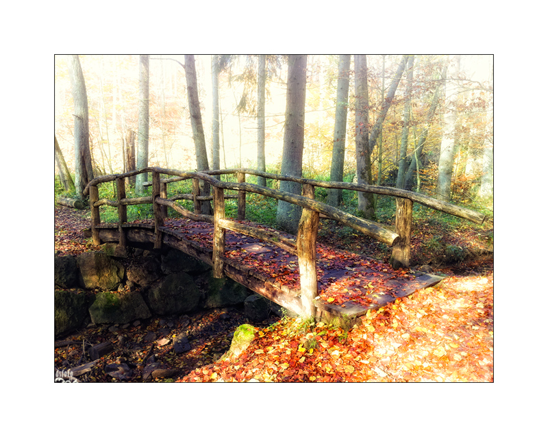 Bridge over empty Bachlauf