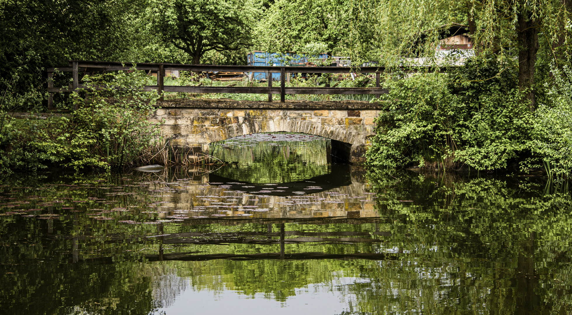 bridge over reflecting water