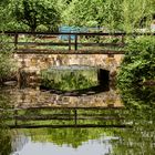 bridge over reflecting water