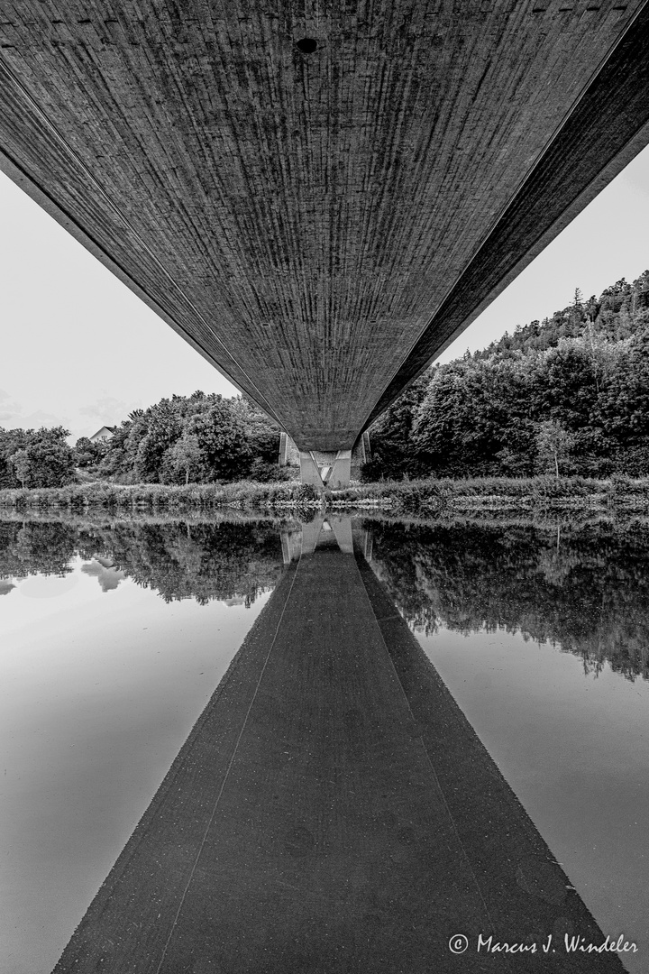 Bridge over silent water