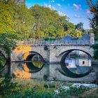 Bridge over still water