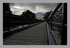 Bridge under troubled sky