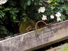 Brunnen mit Schleifstein