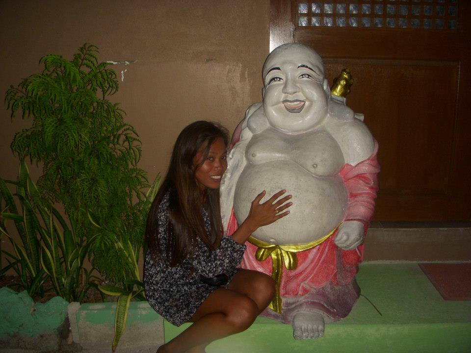 buddha just eat...see big yah smile while rubing tommy 