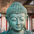 Buddha träumt vor sich hin im Mikado Garten Timmendorferstrand