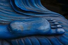 Buddhas blauer Fuß