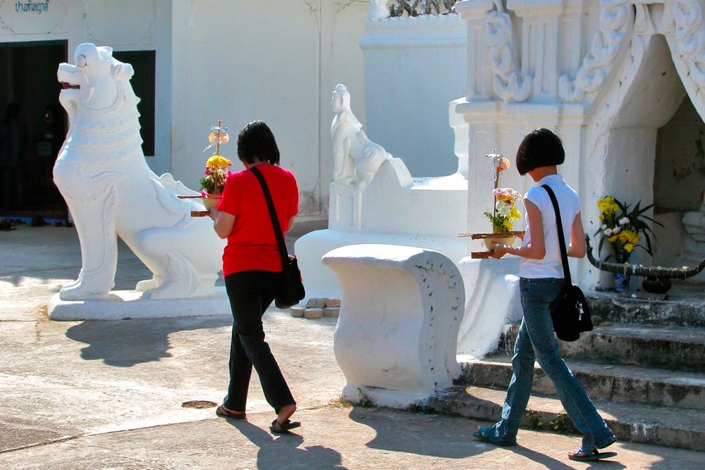 Buddhist believers turn around Wat Phra That Doi Kong Mu
