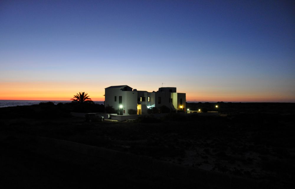 bungalows im sonnenuntergang von Andy Christen 