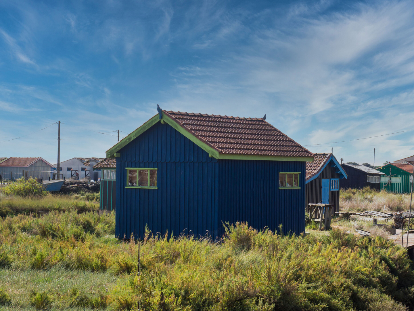 Bunte Hütten der Austernzüchter auf der Île d’Oléron