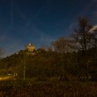 Burg Pyrmont in einer Vollmondnacht im Herbst