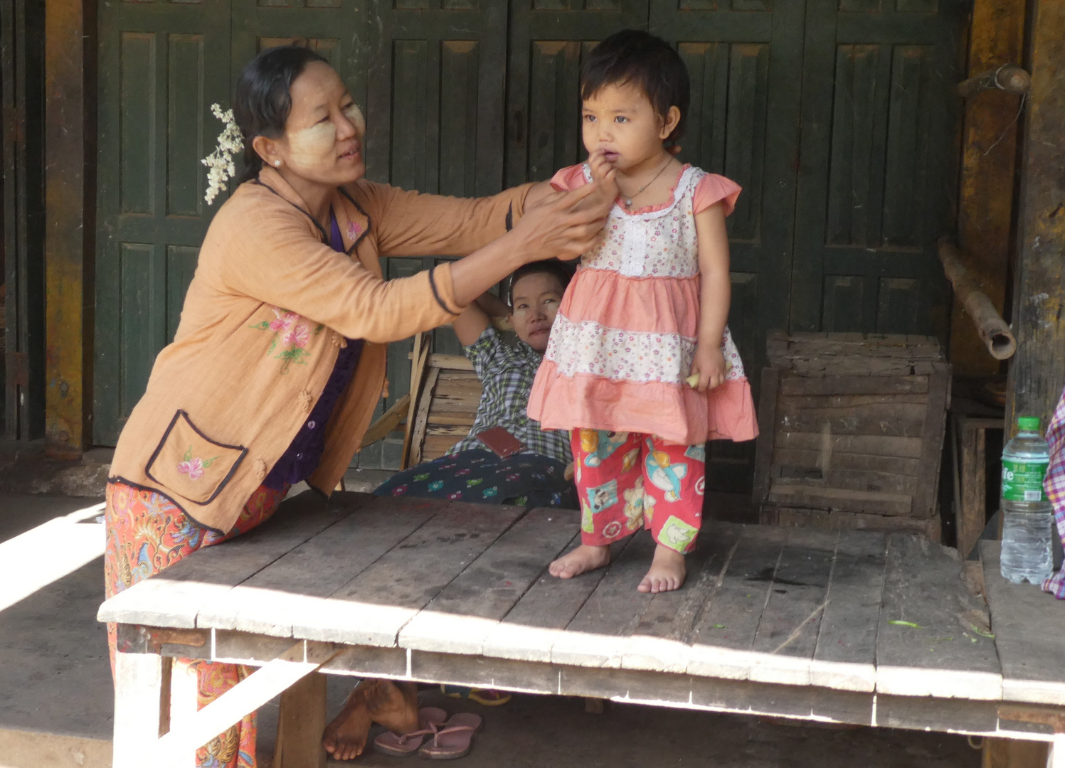 Burmese mother & daughter with thanaka make-up