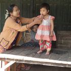 Burmese mother & daughter with thanaka make-up
