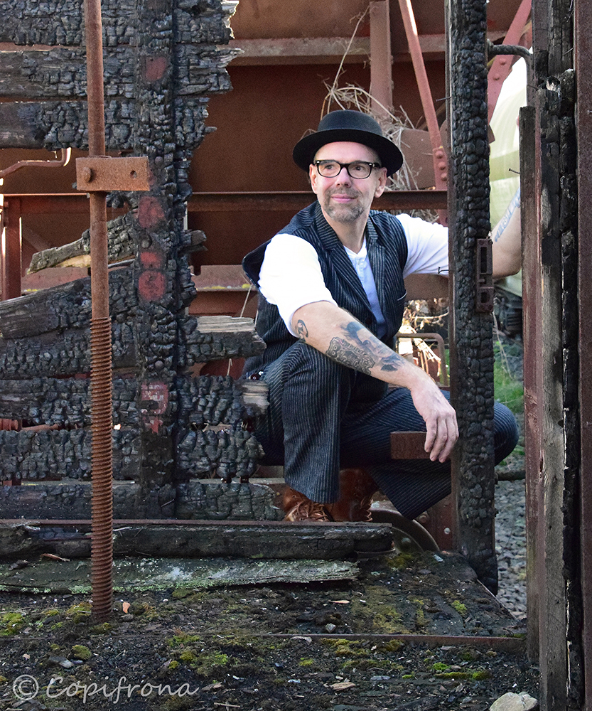 Burned Wood and a stylish Man.