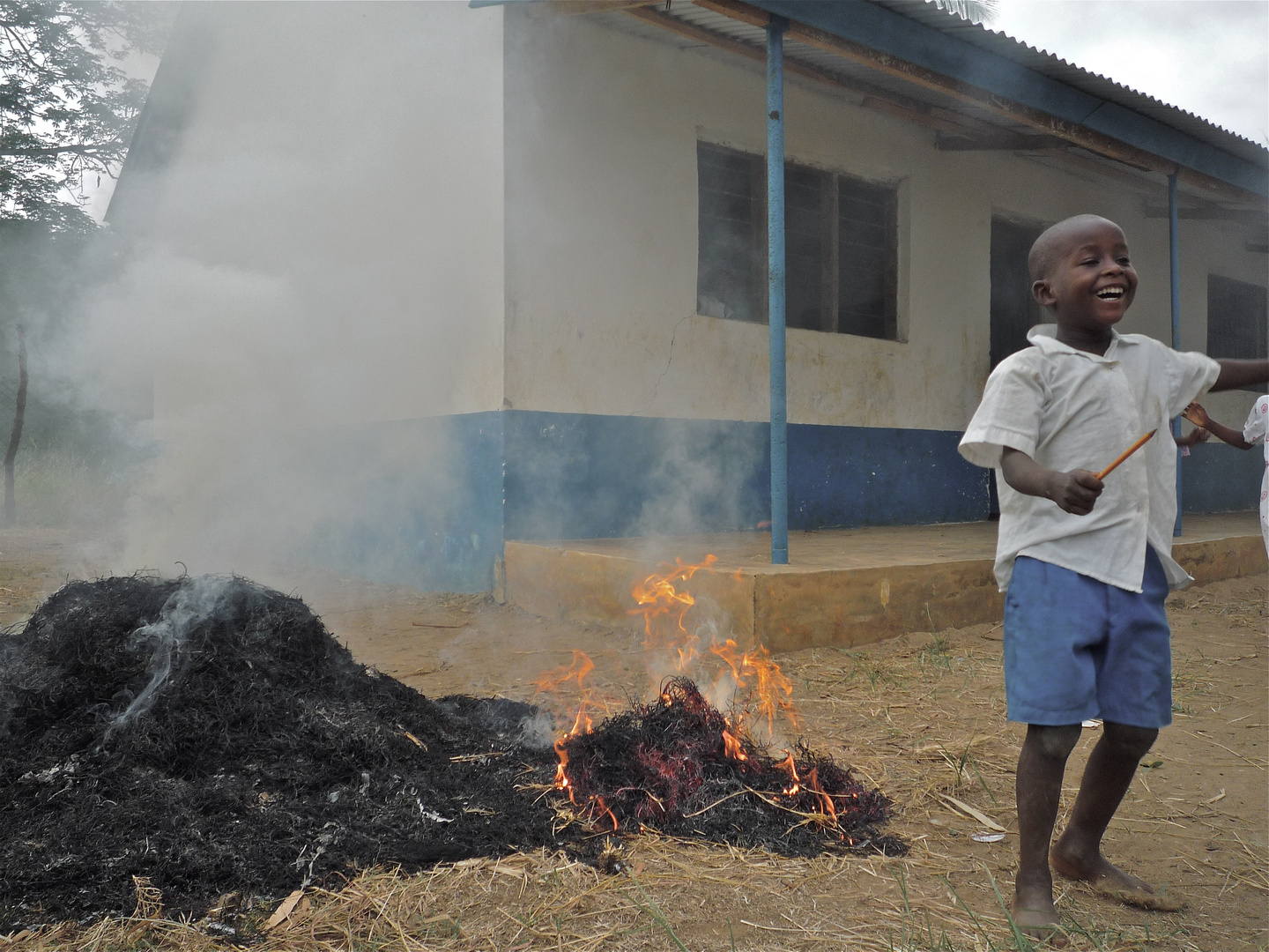 Burning the trash in front of a kindergarden - Kenya