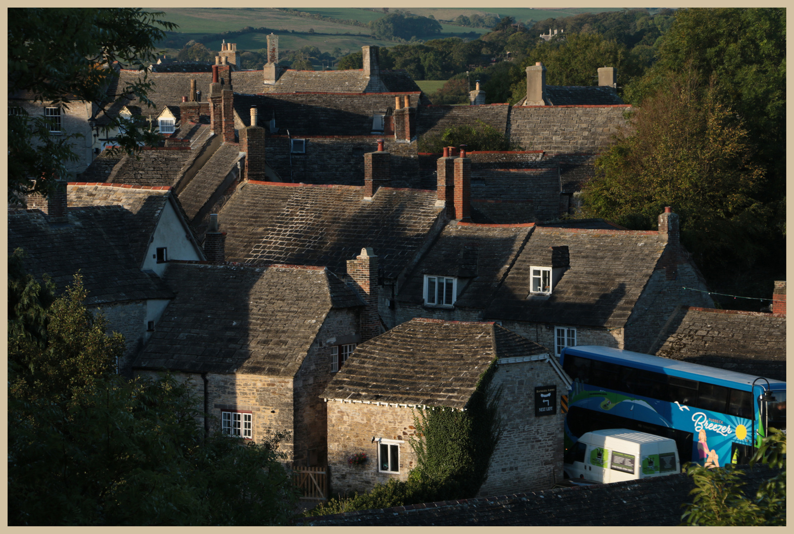 bus passing through corfe castle village