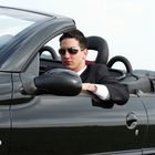 Businessman im Cabrio