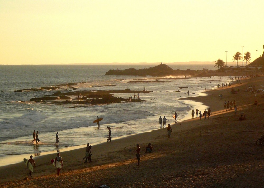 BUSY BEACH AT SUNSET