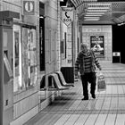 B&W alone at subway