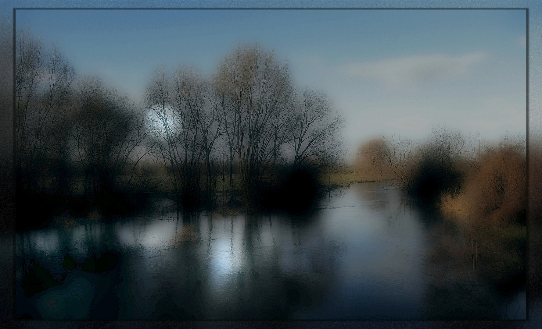 by the river