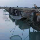 cabanes de pêche sous lumière d'orage, port des brochets