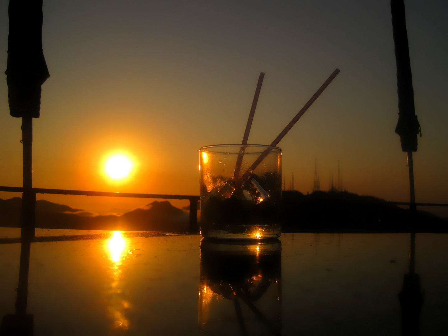 Caipirinha with sunset on Corcovado in Rio de Janeiro