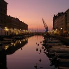 Calano le luci della sera  sul canale di Ponterosso Trieste