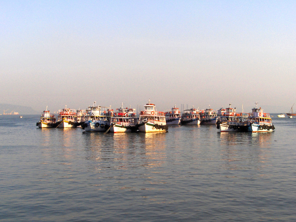 Calm water in front of Taj Mahal Hotel. Wishes of peace for Mumbai.