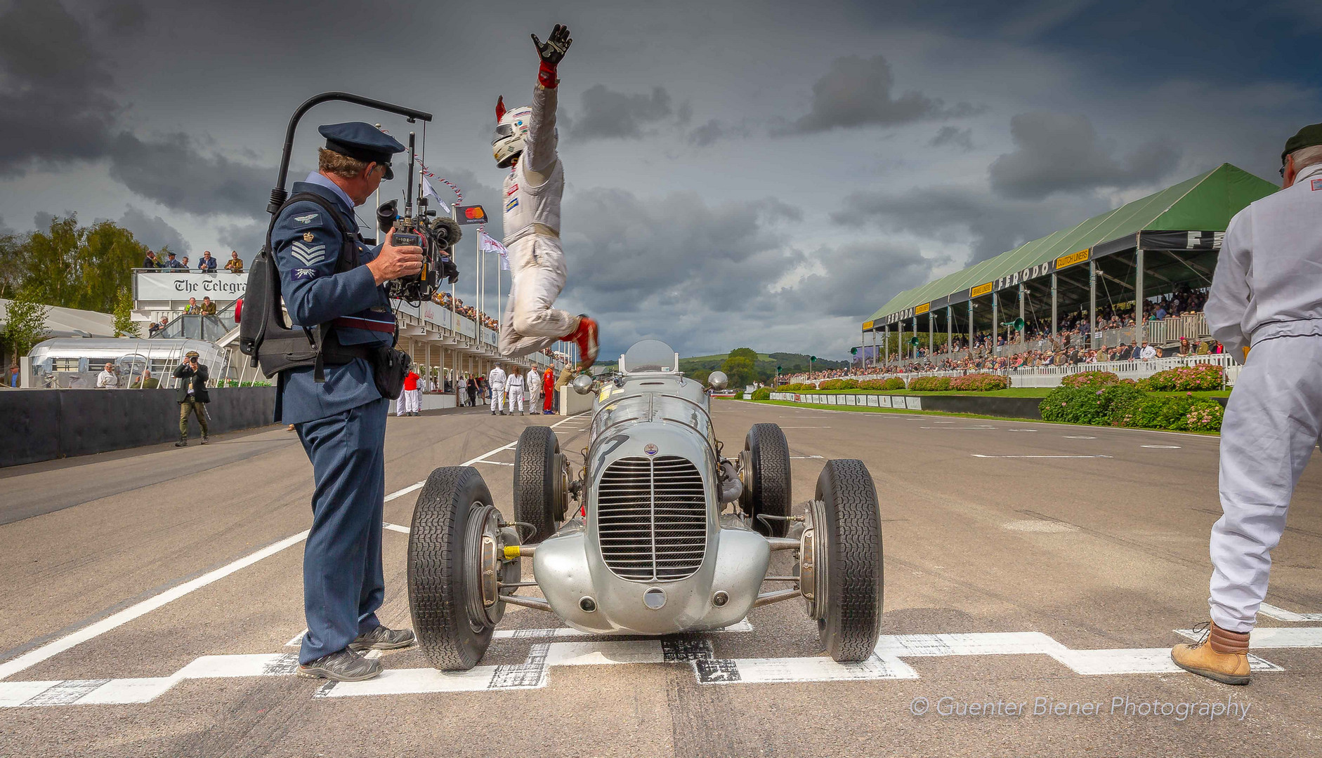 Calum Lockie celebrating his  victory in the  Goodwood Trophy at the Revival 2018