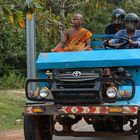 Cambodia...some are protected by god, the others need an helmet...