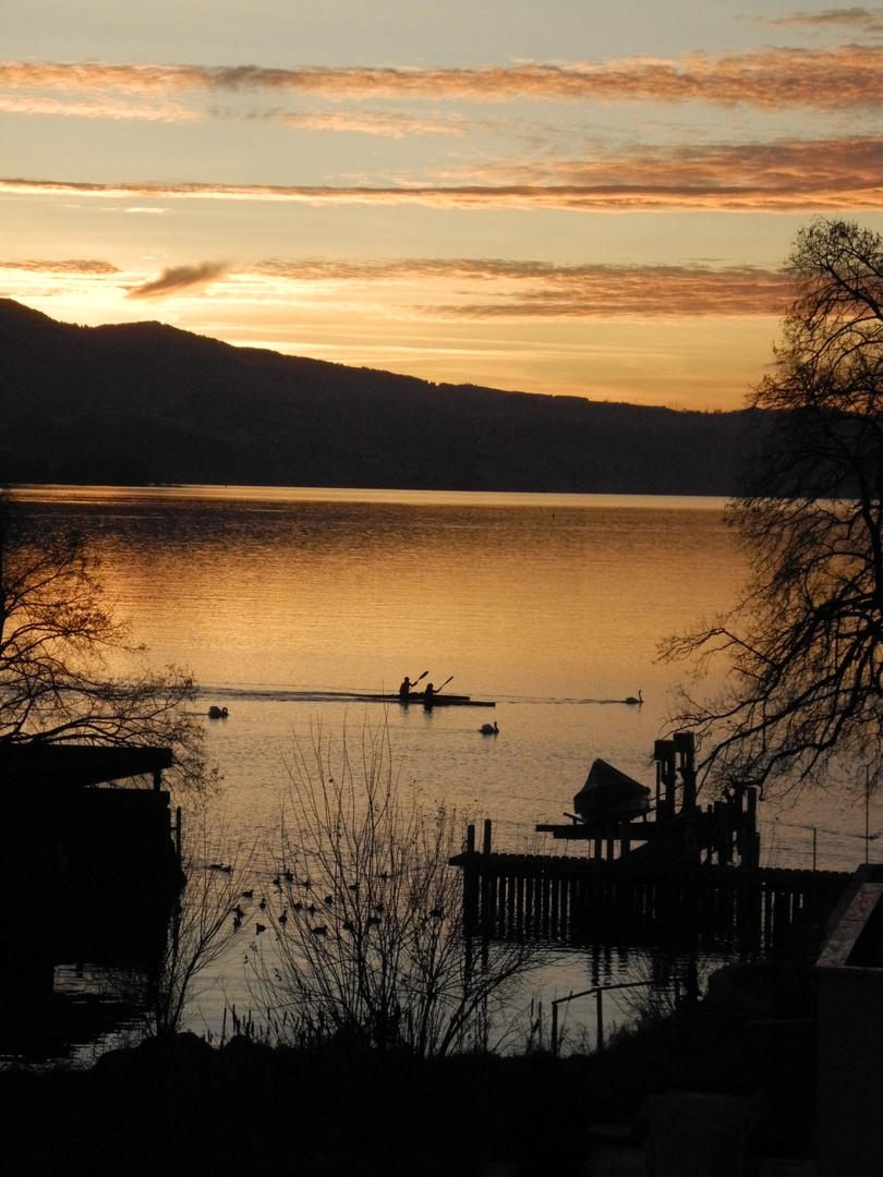 canoeing at sunset