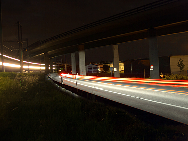 Car vs Train by night