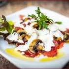 Carpaccio di Manzo con Funghi e Crema di Grana...