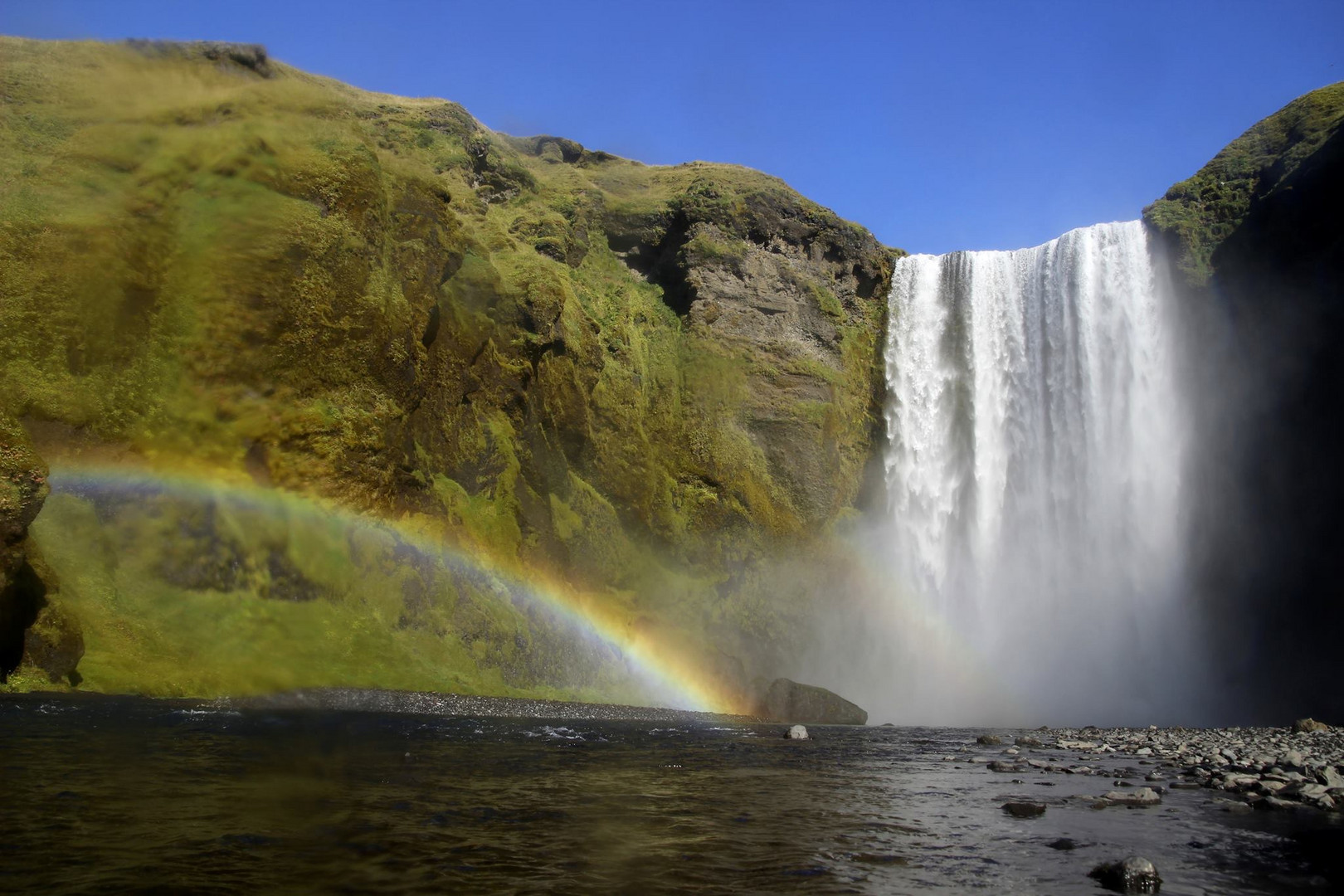 Catching Rainbows at Skogafoss Waterfall