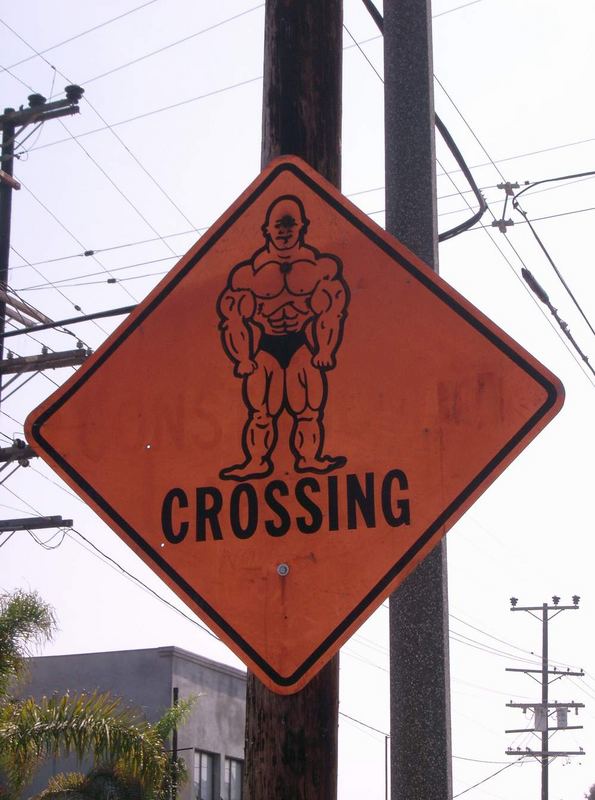 Caution bodybuilder crossing