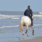 Cavalcando sulla spiaggia