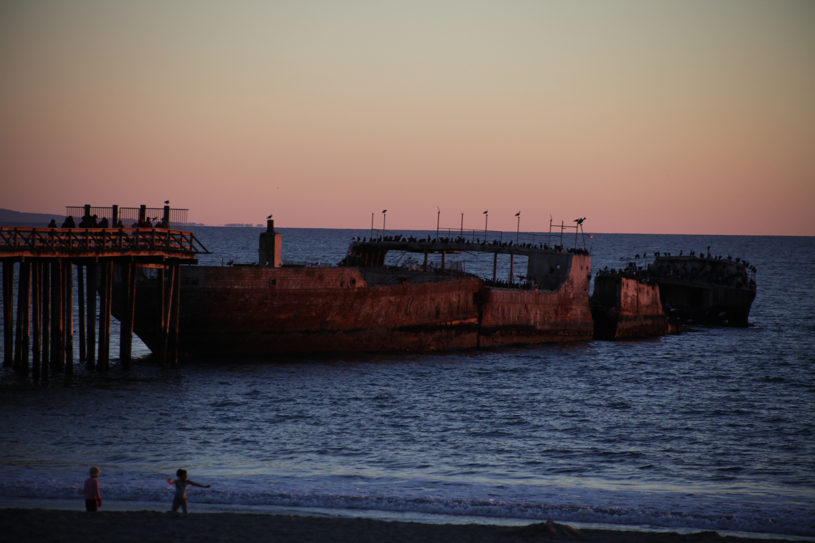 cement ship at sunset - end of days