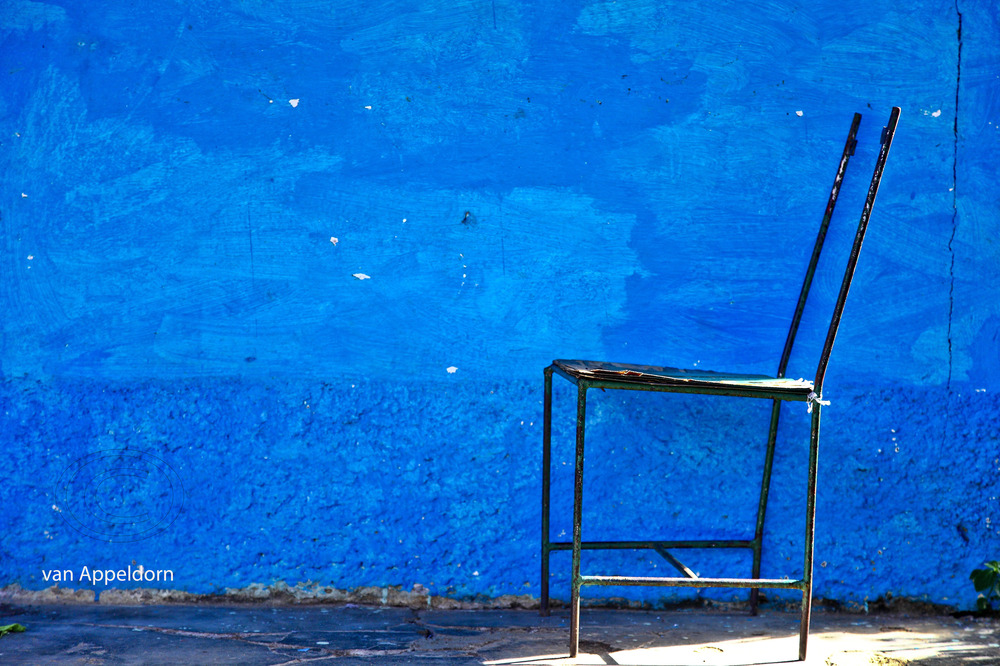 chair and blue wall