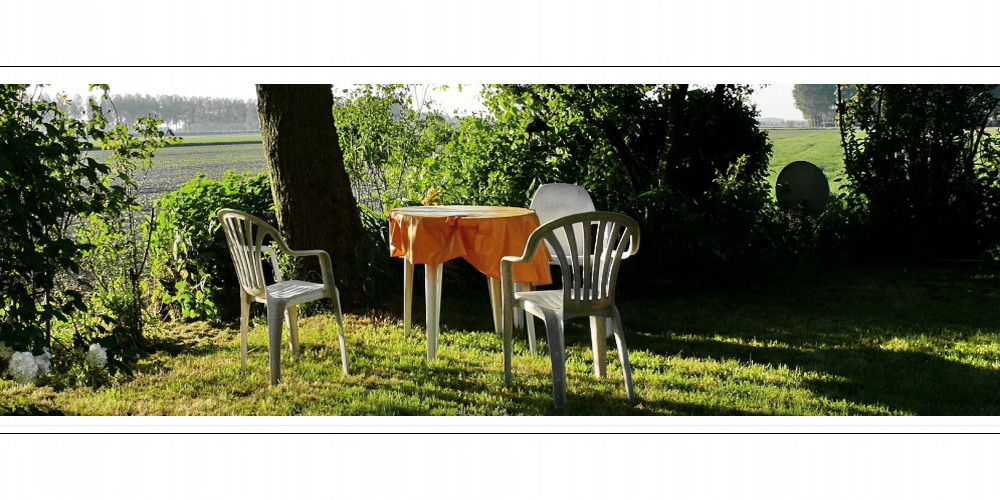 Chair family enjoys the rays of the warming sun...( as the table waits for breakfast)