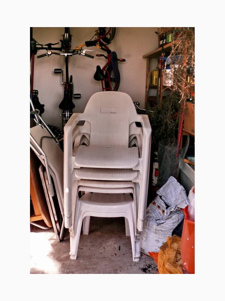 Chair family, stacked up, waiting for their anthropormorphic friends