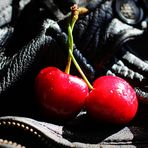 cherries on leather - colored