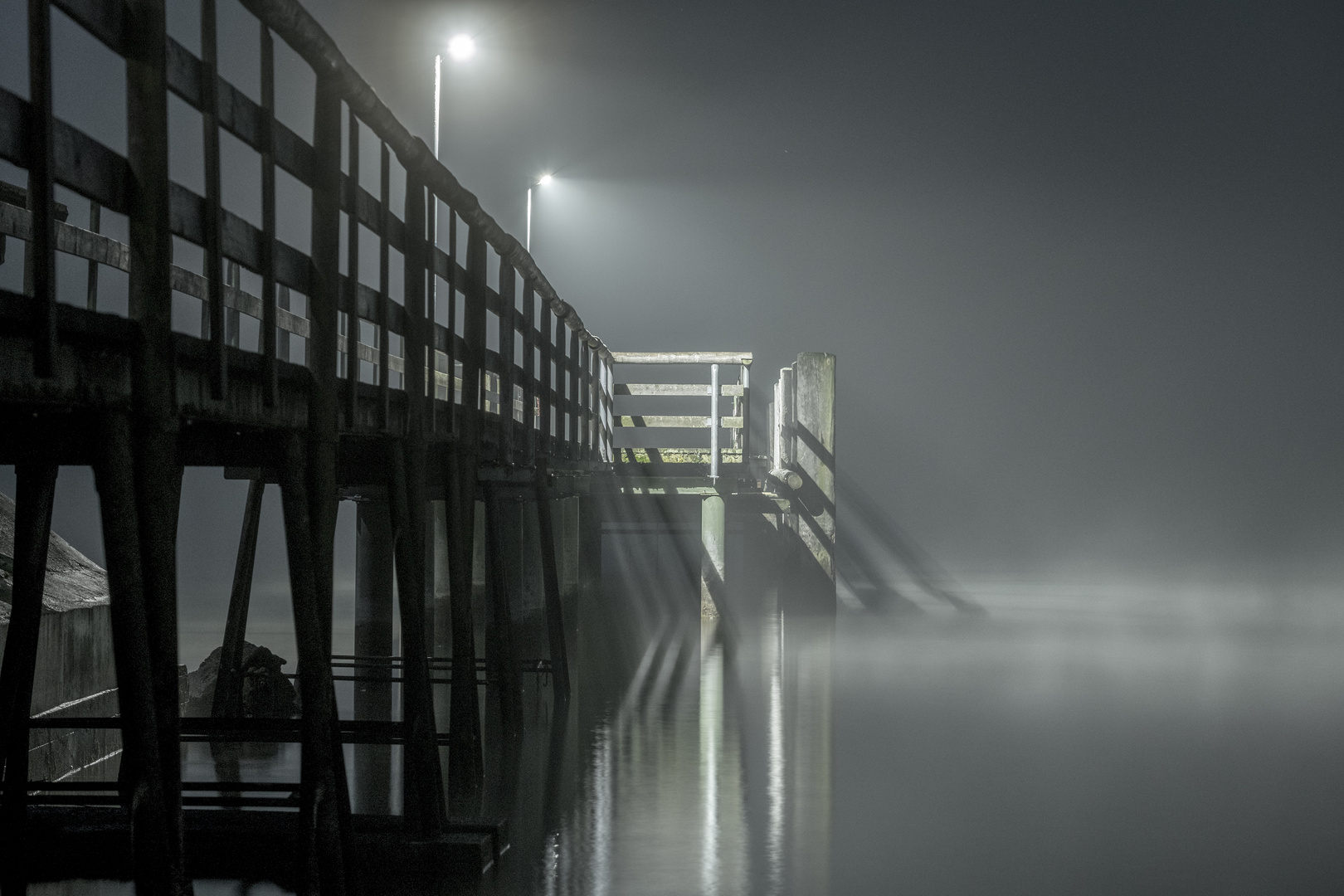 Chiemsee Steg im Nebel 