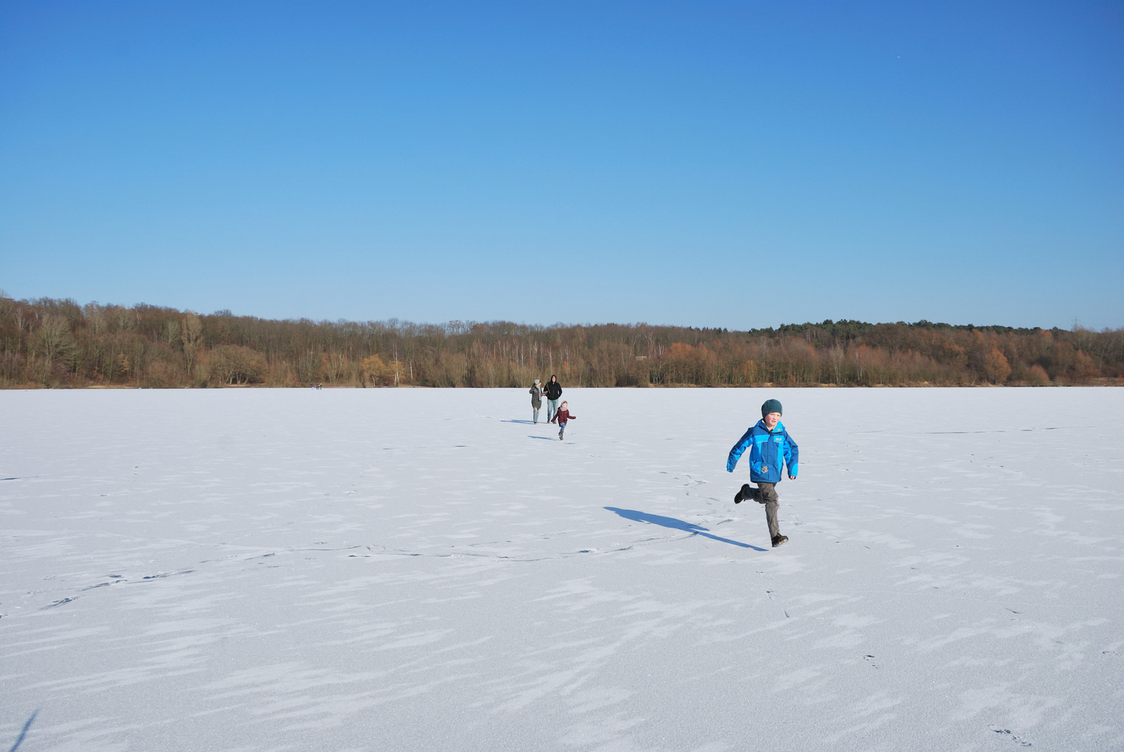 Children are glad - for the first time, for many years, at us the lake has frozen.