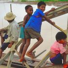 Children at the damaged bridge