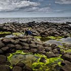 Children discovering Giant's Causeway