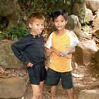 Children play for money from tourist in province Ratanakiri, Cambodia 2009