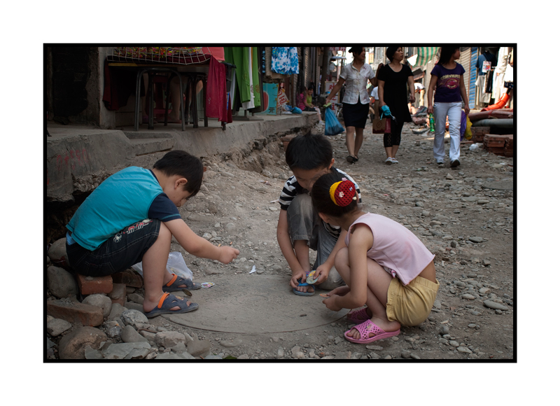 Children playing in a Beijing Hutong