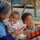 Chinese mam with two kids