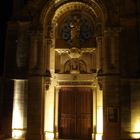 church at night in Arromanches