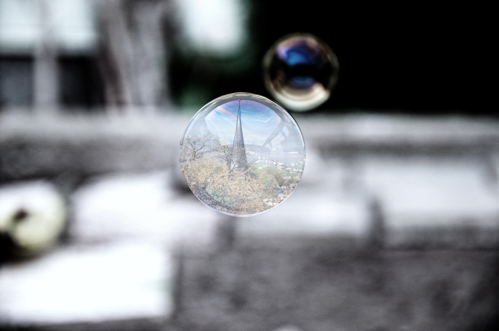 church spire in soap bubble