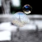 church spire in soap bubble